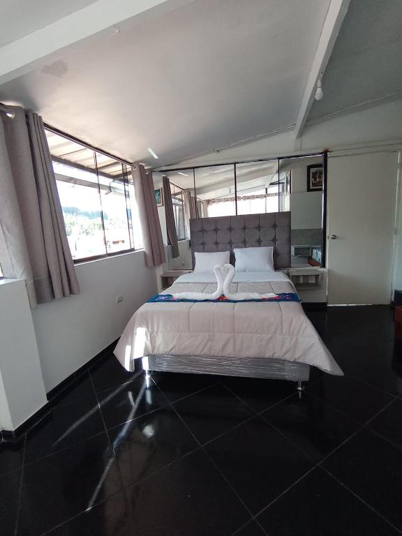 Katil atau katil-katil dalam bilik di HOSTAL La RASA