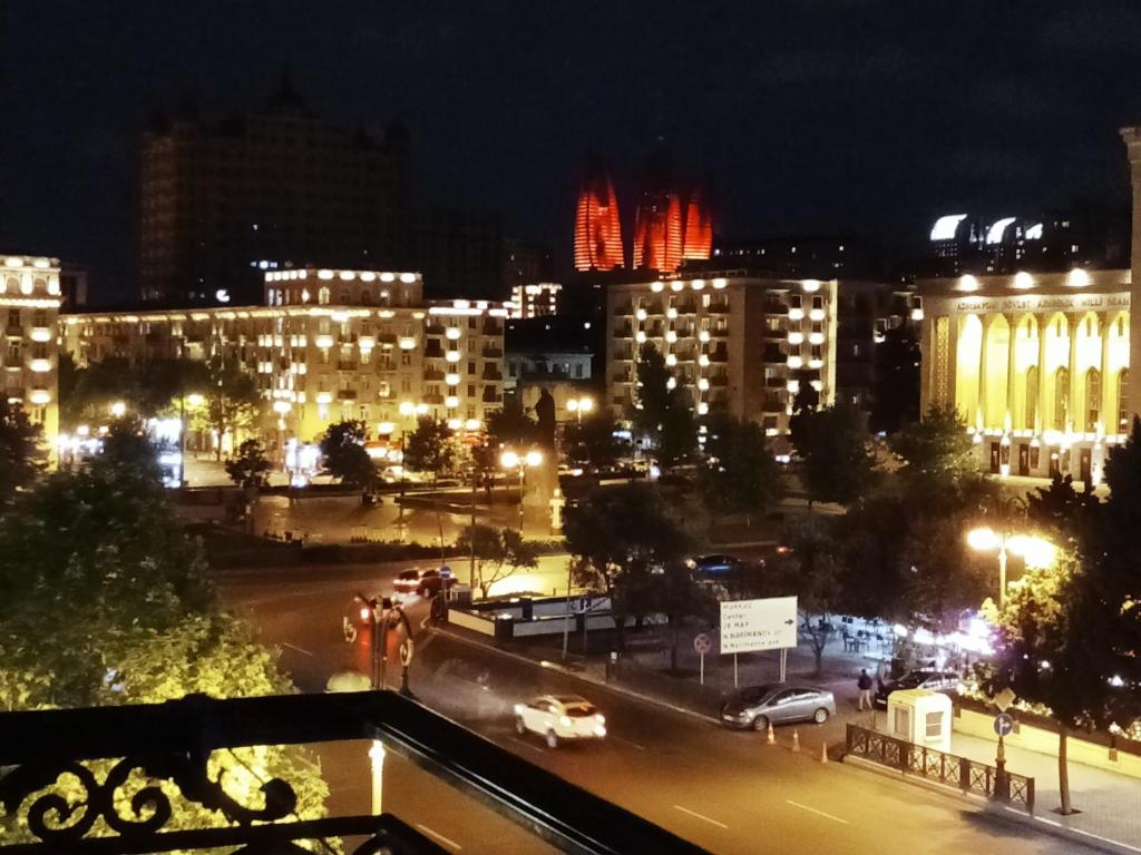 a view of a city at night with lights at Квартира в престижном районе Баку in Baku