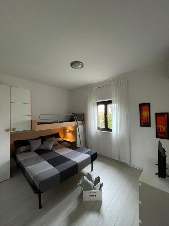 Postel nebo postele na pokoji v ubytování Casa GIO' GIO' Borgo San Basilio