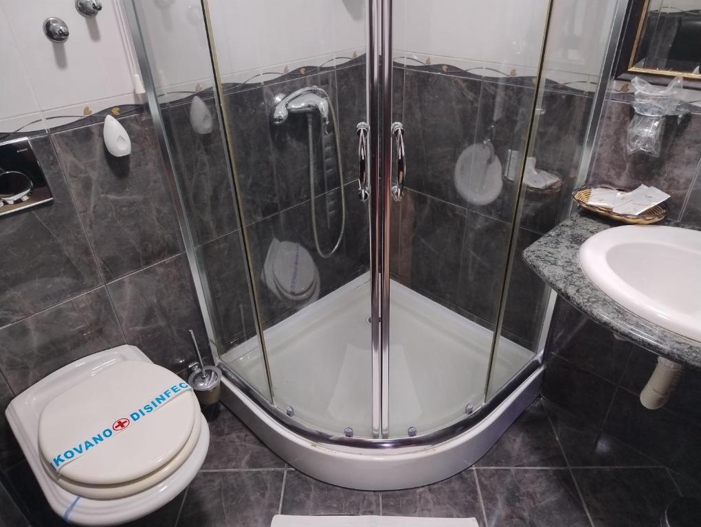 Koupelna v ubytování Hotel Villa Majur