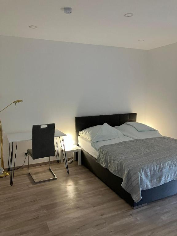 Postel nebo postele na pokoji v ubytování Moderne Einliegerwohnung nähe Ingolstadt und Bad Gögging