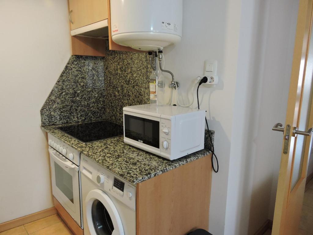A kitchen or kitchenette at Duplex casco historico