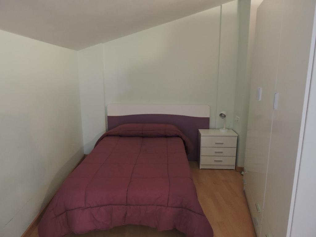 A bed or beds in a room at Duplex casco historico