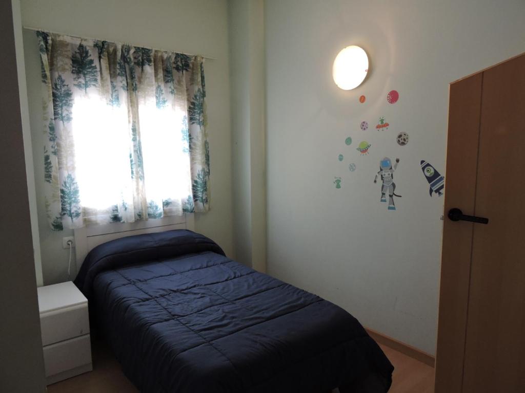 A bed or beds in a room at Duplex casco historico