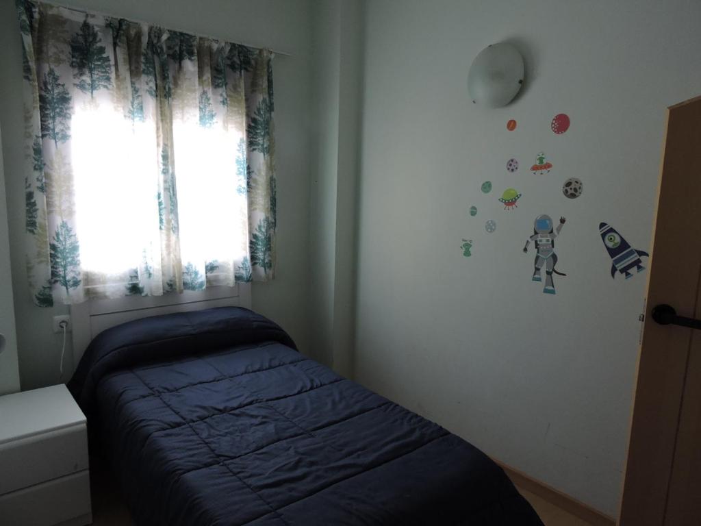 A bed or beds in a room at Duplex casco historico