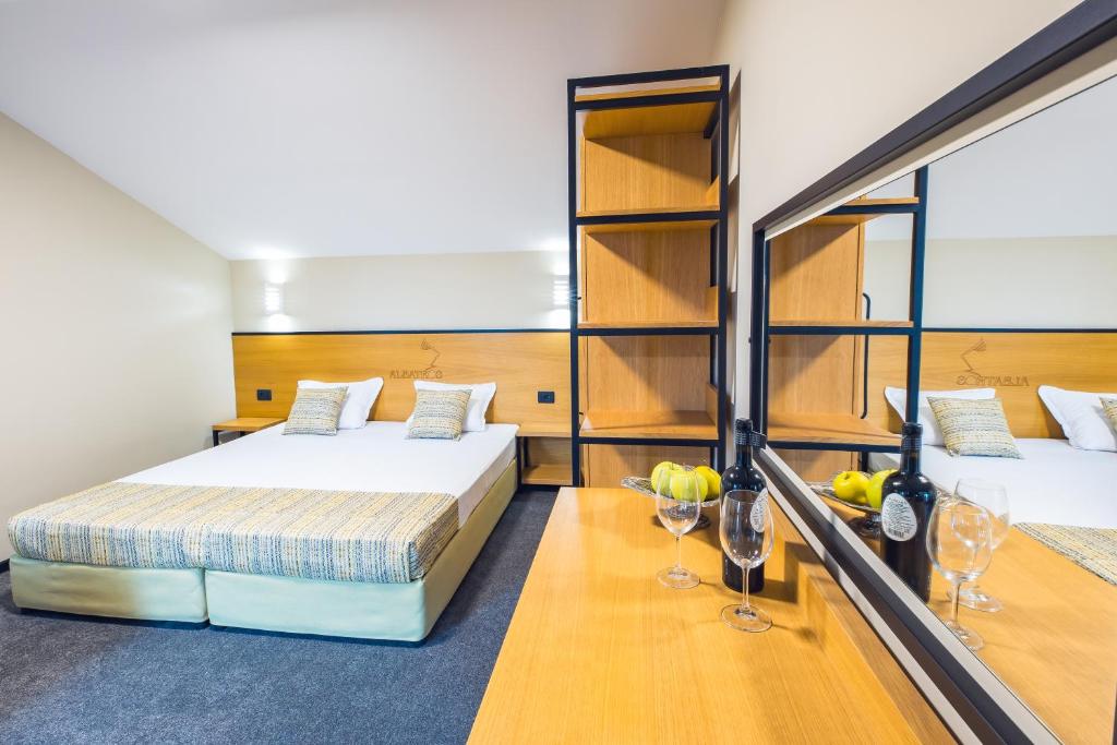Postel nebo postele na pokoji v ubytování Hotel Albatros New Town