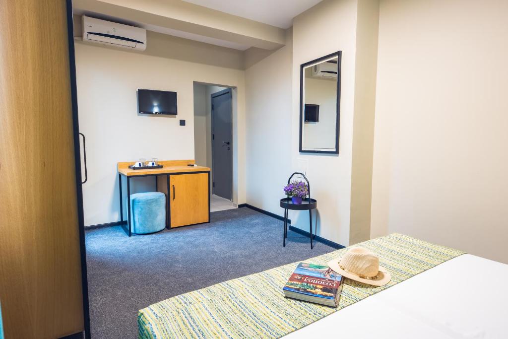Postel nebo postele na pokoji v ubytování Hotel Albatros New Town