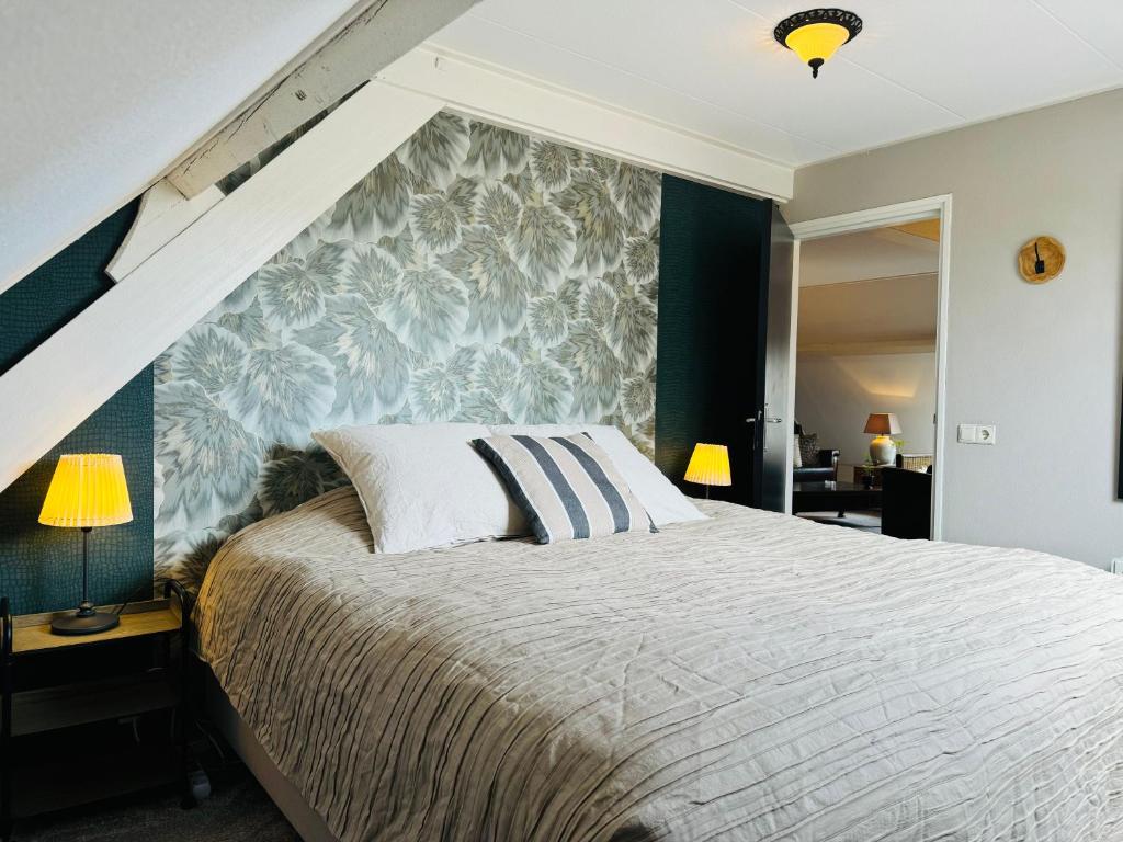 Postel nebo postele na pokoji v ubytování B&B De Dorpshoeve