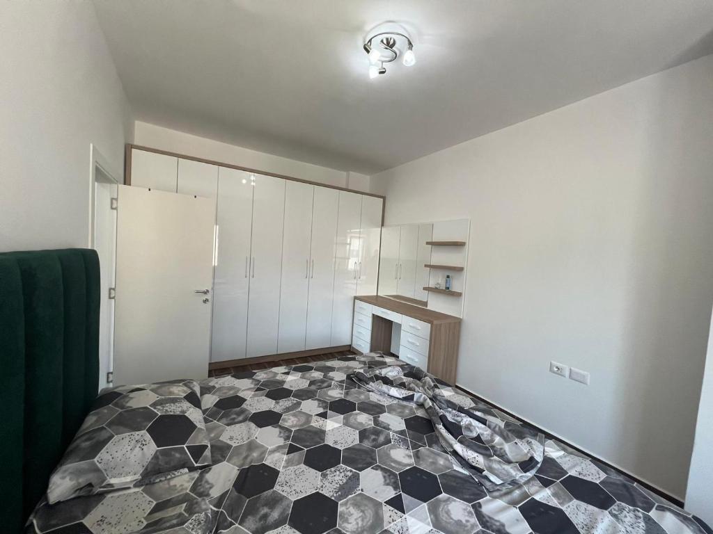 Voodi või voodid majutusasutuse Djonis Apartment toas
