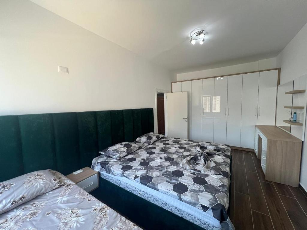 Voodi või voodid majutusasutuse Djonis Apartment toas