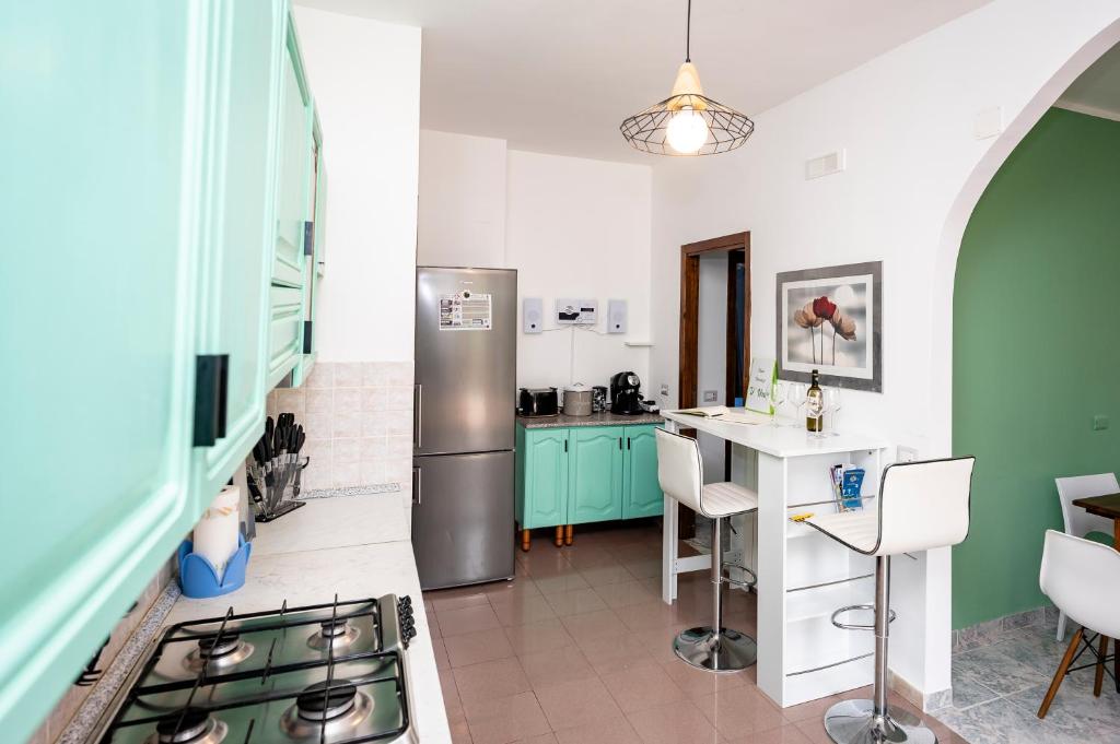 A kitchen or kitchenette at Casa Vacanze D'Urso