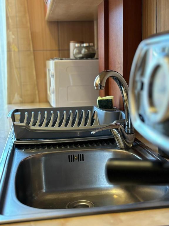 Kuchyň nebo kuchyňský kout v ubytování Kiadó apartman