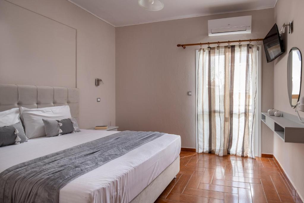 Posteľ alebo postele v izbe v ubytovaní house giota