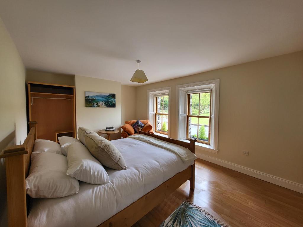 Postel nebo postele na pokoji v ubytování Reeks Country House