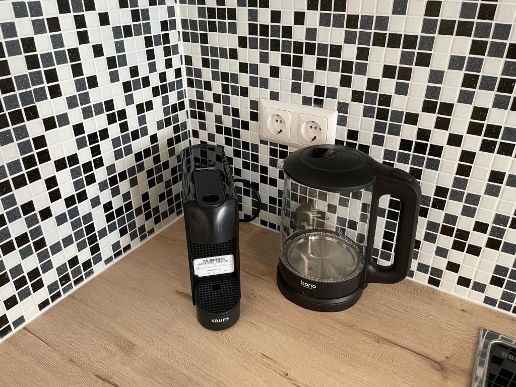 Příslušenství pro přípravu čaje a kávy v ubytování Nici´s Appartements