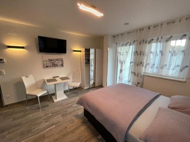Postel nebo postele na pokoji v ubytování Nici´s Appartements