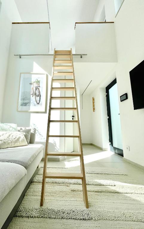 Postel nebo postele na pokoji v ubytování Tiny House Wettelsheim