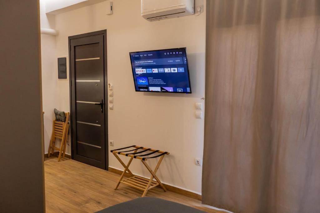 TV a/nebo společenská místnost v ubytování Calma Guest House