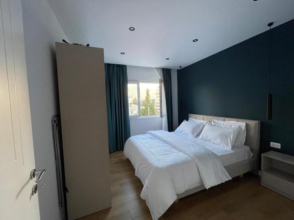 Postel nebo postele na pokoji v ubytování Central Modern Apartment