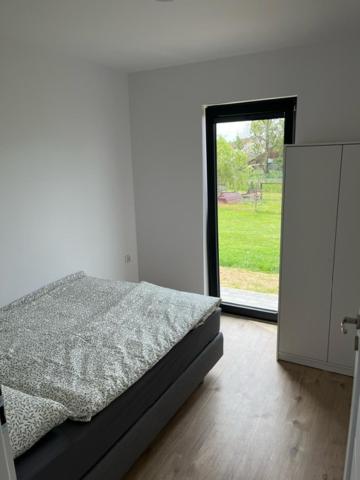 Posteľ alebo postele v izbe v ubytovaní Jula - apartamenty w Kudowie-Zdrój