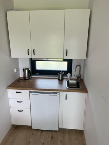 Kuchyňa alebo kuchynka v ubytovaní Jula - apartamenty w Kudowie-Zdrój