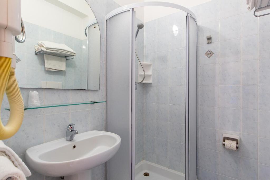 Koupelna v ubytování Hotel Metropole