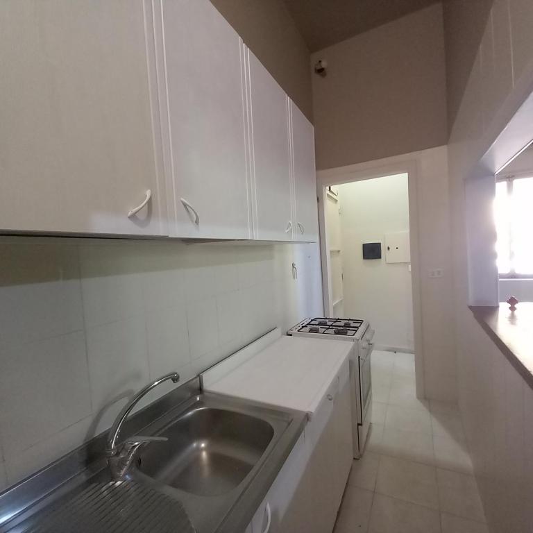 Kuchyňa alebo kuchynka v ubytovaní Dimore del Carrubo - villa con piscina