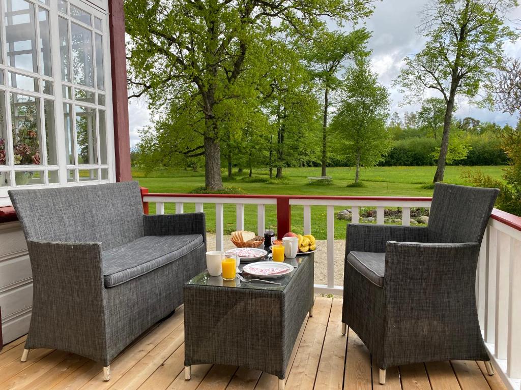 Posezení v ubytování Kursi Summer Manor