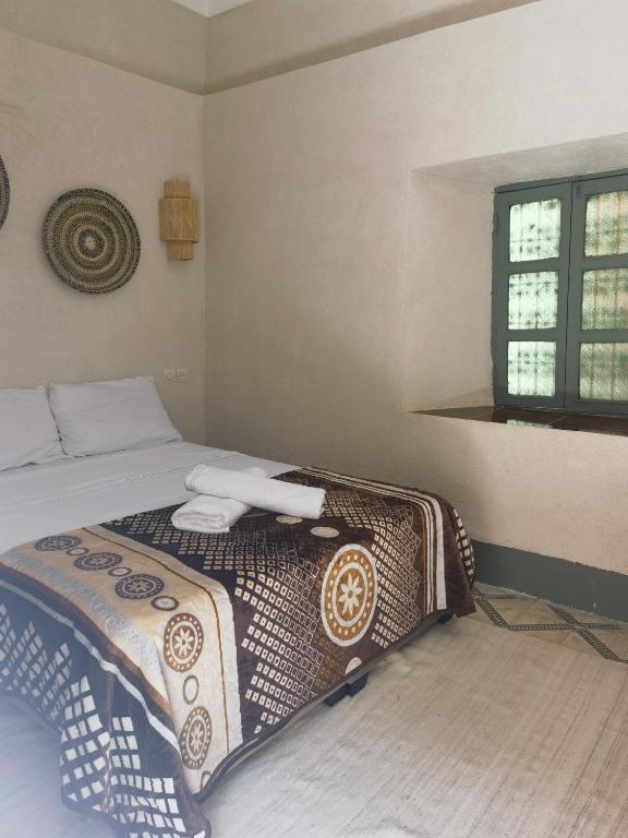 Postel nebo postele na pokoji v ubytování Medina Oasis Hostel