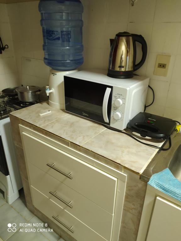 Kuchyň nebo kuchyňský kout v ubytování Amplio apartamento a pasos de los principales centros de compras