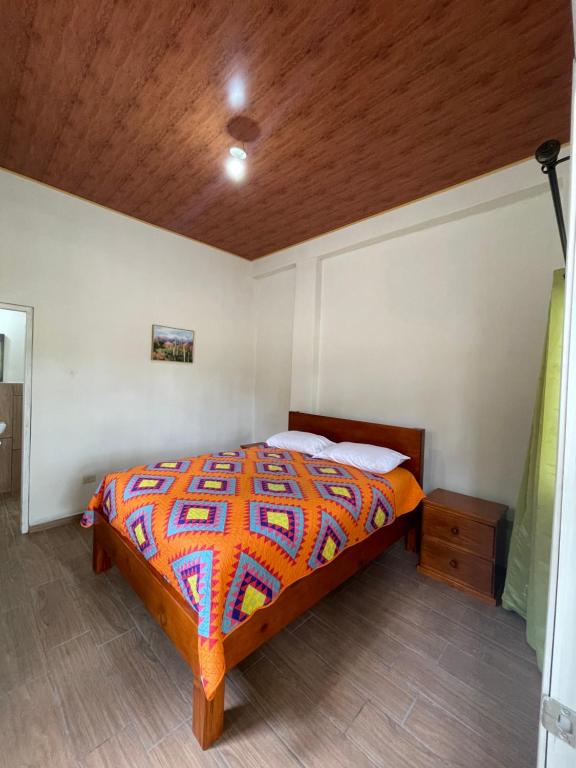 Postel nebo postele na pokoji v ubytování Glamping Anturios