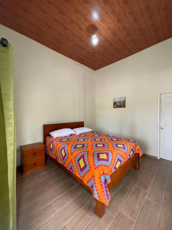 Postel nebo postele na pokoji v ubytování Glamping Anturios