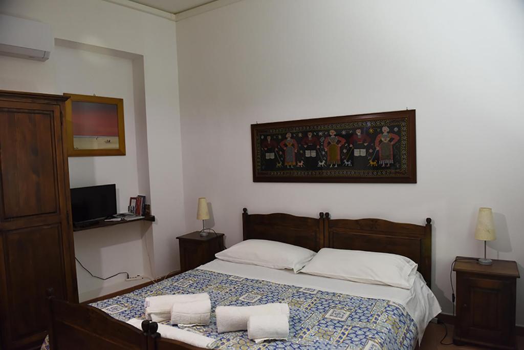 Postel nebo postele na pokoji v ubytování B&B ABACO