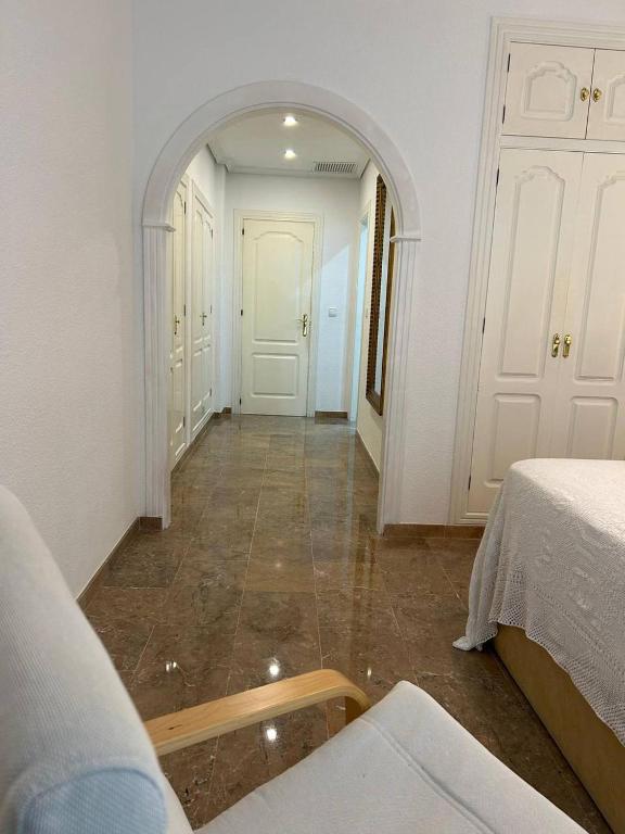 Postel nebo postele na pokoji v ubytování REGIDOR Cartagena