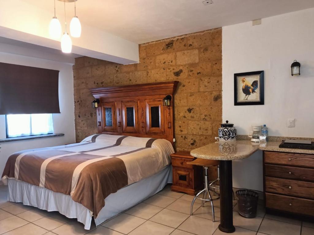 Postel nebo postele na pokoji v ubytování Rancho Labradores