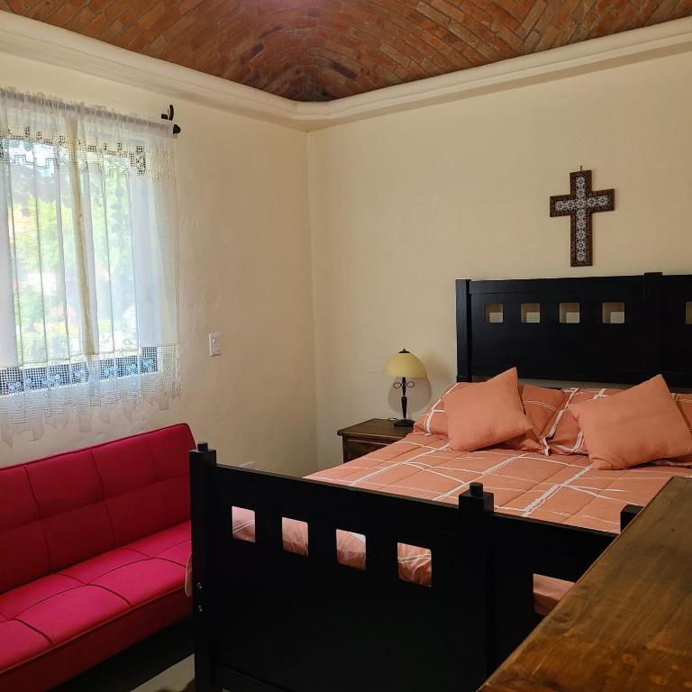 Postel nebo postele na pokoji v ubytování Rancho Labradores