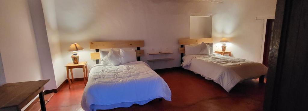 Postel nebo postele na pokoji v ubytování Alojamiento El Fresno