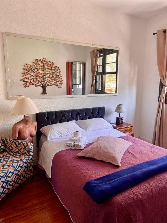 Uma cama ou camas num quarto em Galeria SP Hostel
