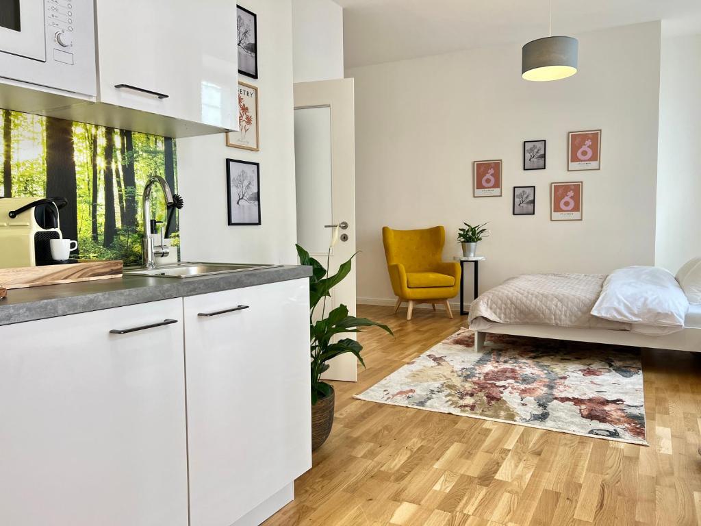 Kuchyň nebo kuchyňský kout v ubytování Treetess City Centre Prague Apartments