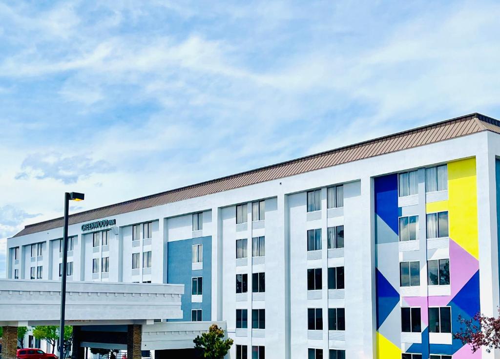 a building with a colorful mural on the side of it at Greenwood Inn in Greenwood Village