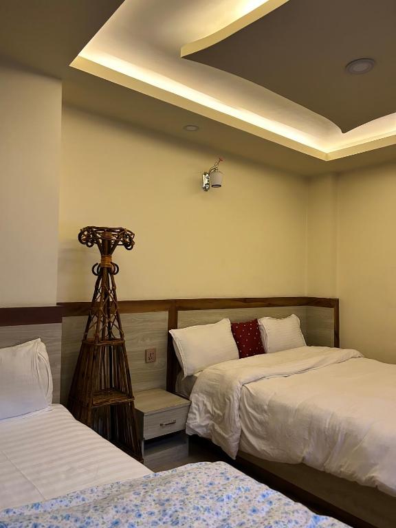 Postel nebo postele na pokoji v ubytování Hotel Balgopal