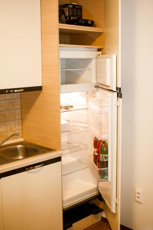 Kuchyňa alebo kuchynka v ubytovaní Apartmán Tále č.309