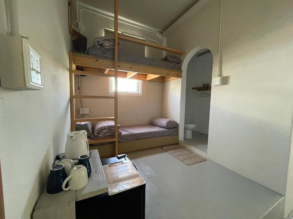 Postel nebo postele na pokoji v ubytování 春色領地 Vibelance inn