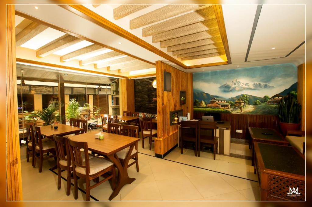 Restaurace v ubytování Hotel Maya Boutique & Apartment