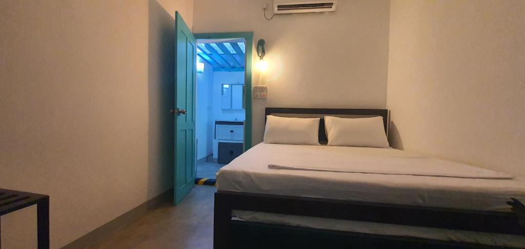 Postel nebo postele na pokoji v ubytování Hello Airport Hotel, Katunayaka