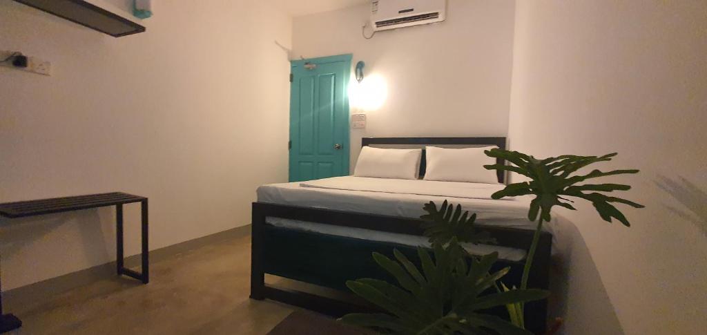 Postel nebo postele na pokoji v ubytování Hello Airport Hotel, Katunayaka