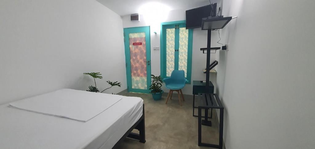 Postel nebo postele na pokoji v ubytování Hello Airport Hotel, Katunayaka