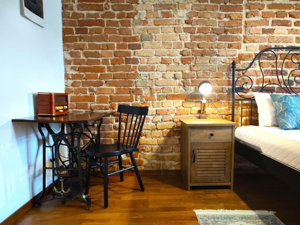 Posteľ alebo postele v izbe v ubytovaní Apartament Skorpion Centrum