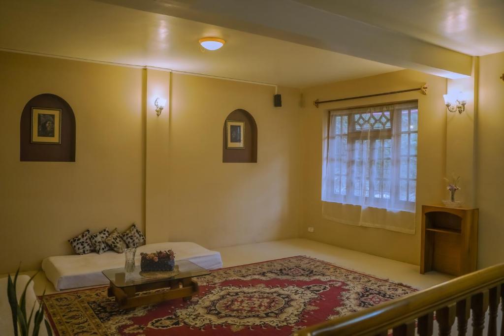 Postel nebo postele na pokoji v ubytování MISSION VALLEY Kalimpong