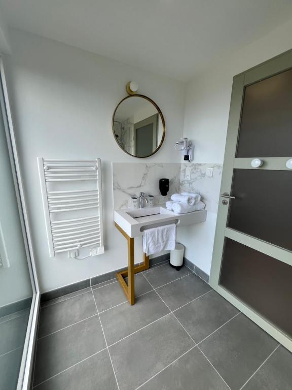 Koupelna v ubytování Hotel du Trégor